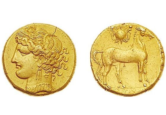 Tête de Tanit couronnée Carthage (vers 260 avant J.-C.) Cheval libre au-dessus, disque solaire entre deux cobra.